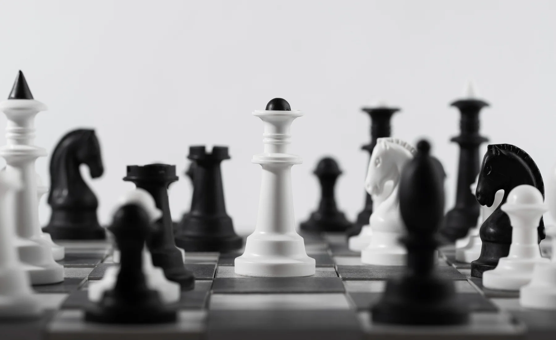 A chessboard representing connected business strategy and deliberate sequencing